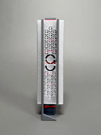 Gray chalk dispenser with Cue Action logo on it