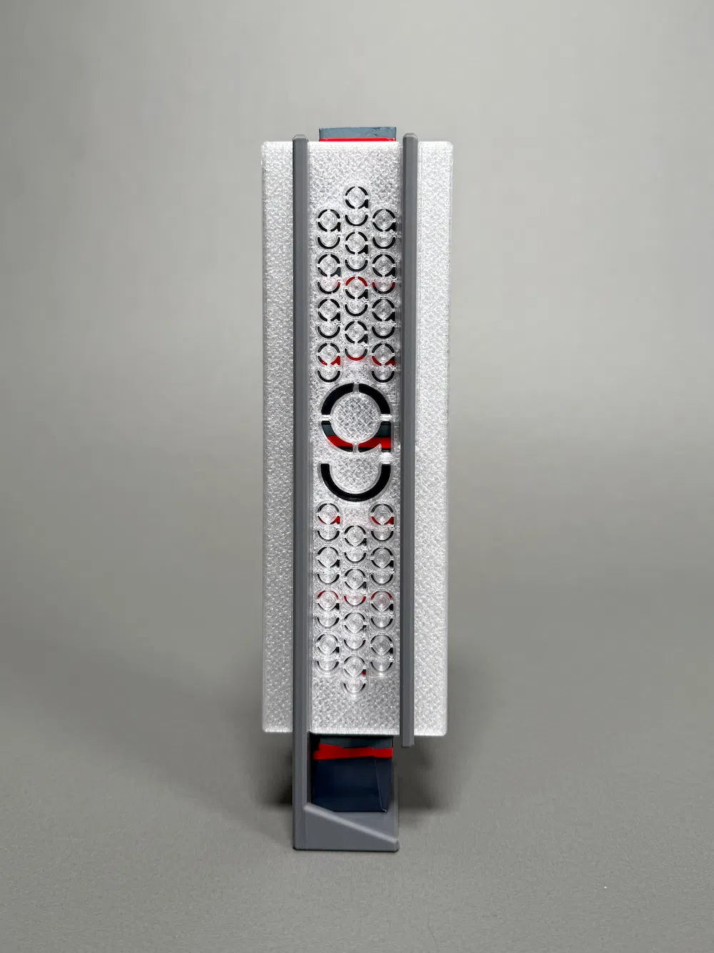 Gray chalk dispenser with Cue Action logo on it