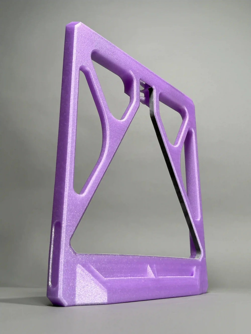 Purple 3D-printed DB snooker triangle on a  gray background