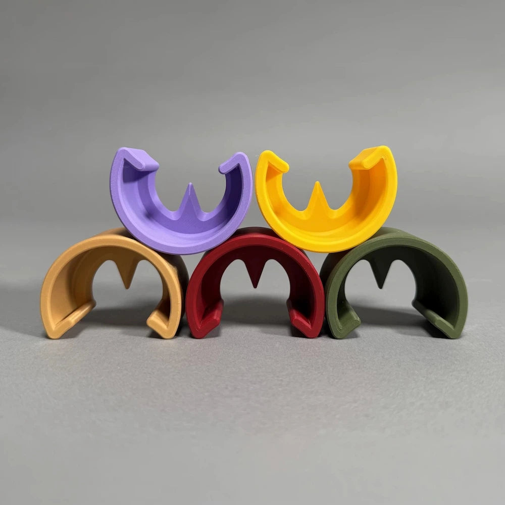 Five colorful ball markers  on a gray background