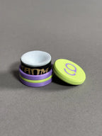 chalk holder designed by cue action in green and purple