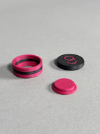 chalk holder designed by cue action in black and dark pink