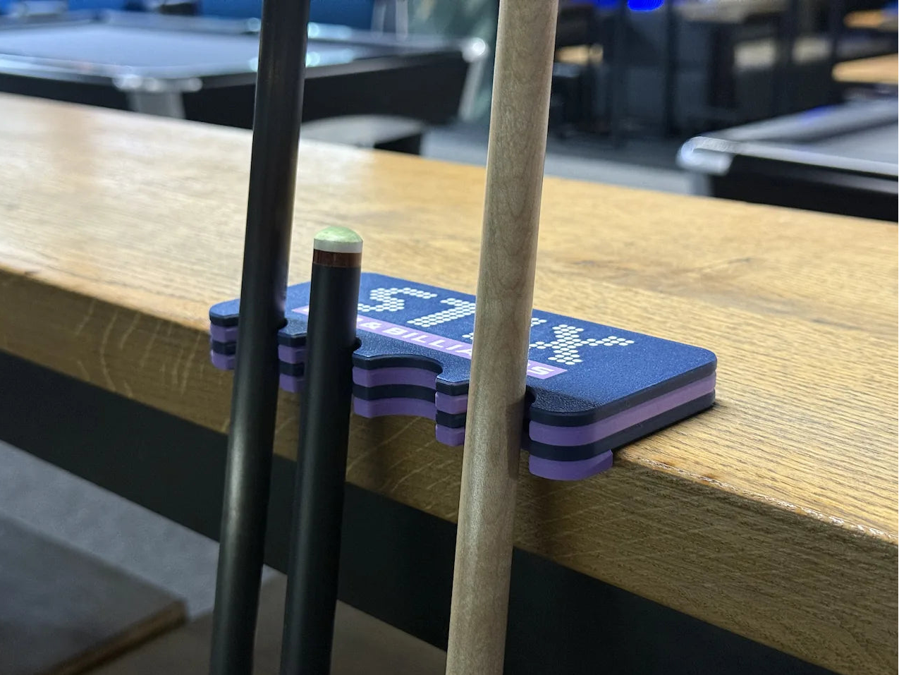 Blue club holder with brand logo