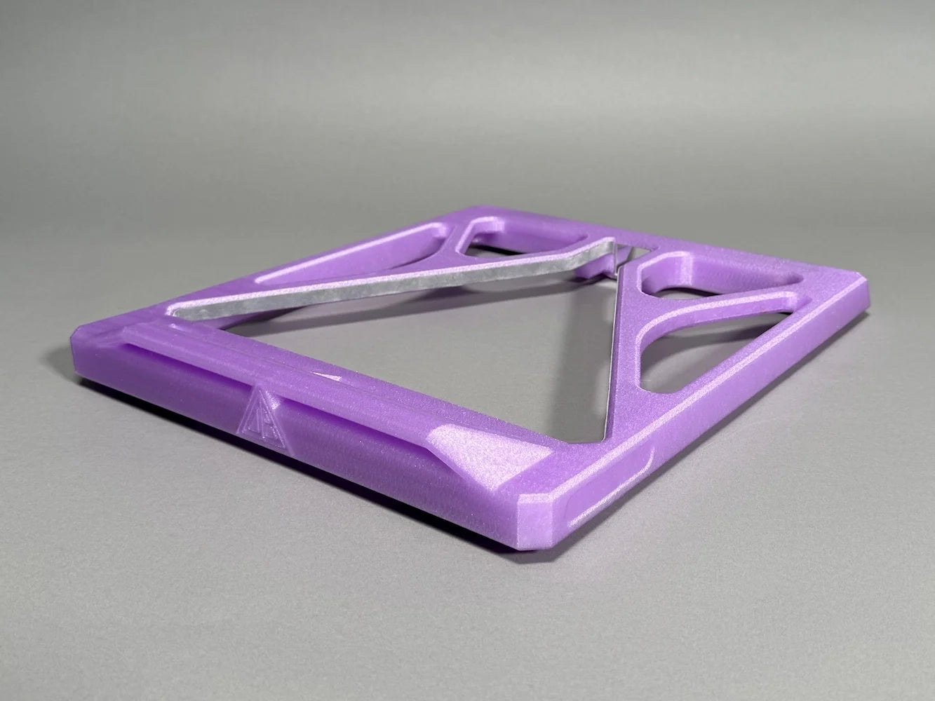 angle shot of a purple snooker triangle 